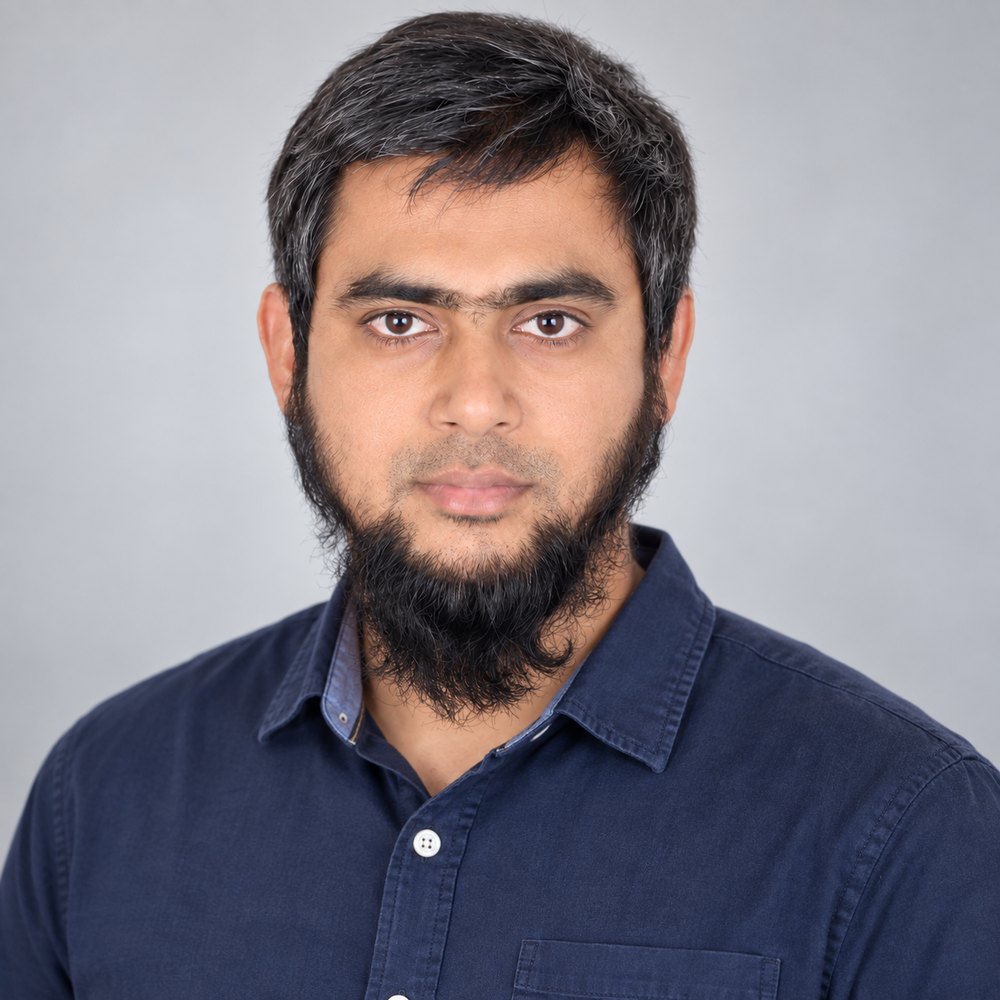 Masud Rana, portrait in a navy shirt